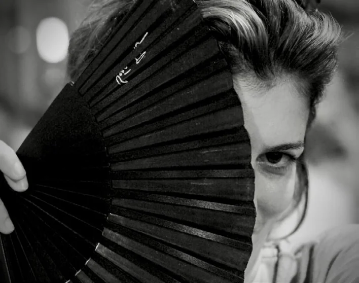 Portrait with a black fan